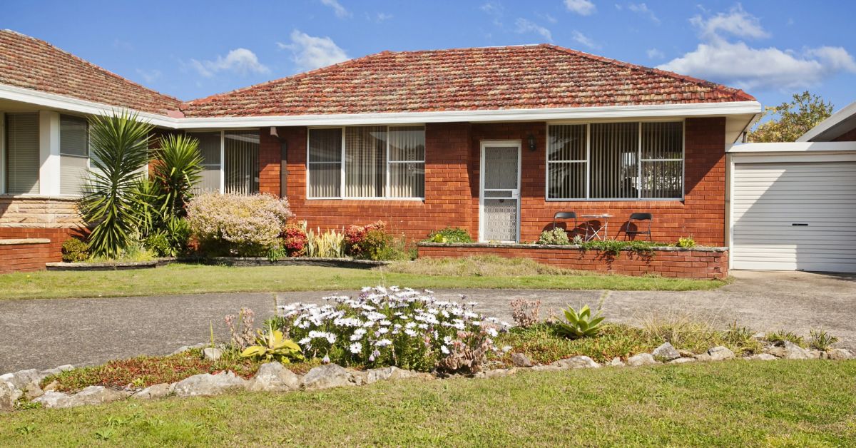 An old home constructed with asbestos and bricks